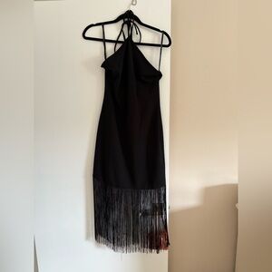 Black halter dress/never worn. Dress is currently on sale at Off fifth for 69.99